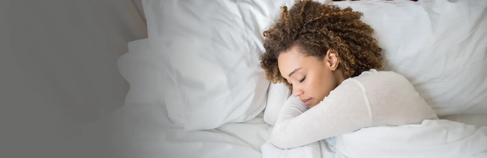 woman sleeping in bed bug free bed